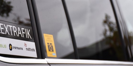 Bil med Flextur-skilt